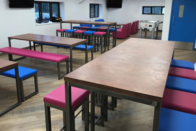 Worx Dining and Poseur Tables and stools with upholstered seat pads, and Izzy Modular seating